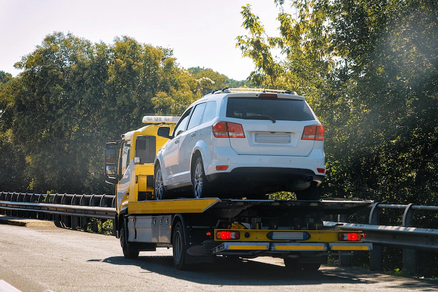 tow-truck-with-car-road-north-west-recoveries